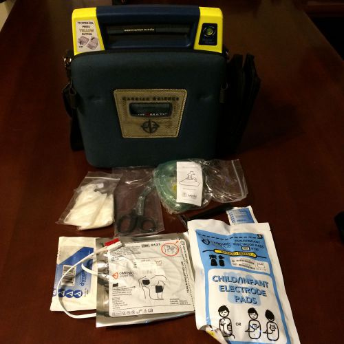 Cardiac science powerheart g3 aed with ready kit, new pedi/adult pads &amp; new batt for sale