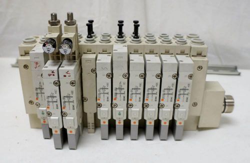 SMC BLOCK WITH 7 SV3100-5FU VALVES &amp; 2 SV3500-5FU VALVES !!!          J881