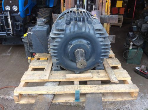 General Electric 100 hp motor electric 575 volt / 3 ph   99 amp / rebuilt motor