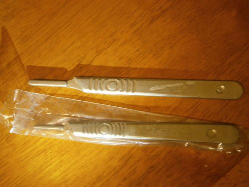 SWANN MORTON NUMBER 3 (USED) AND 4 (NEW) SCALPEL HANDLE MADE IN THE UK