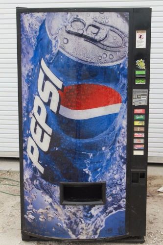Vendo  Pepsi Vending Machine for parts or repairs fridge is working freezing