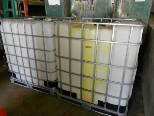 Used ibc liquid bulk totes: 330 gallon size, picture shows previous contents. for sale