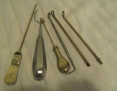 group of vintage dental tools, unusual