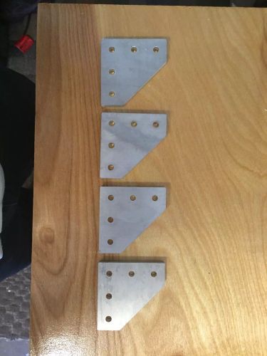 A lot of four aluminum corner brackets for sale