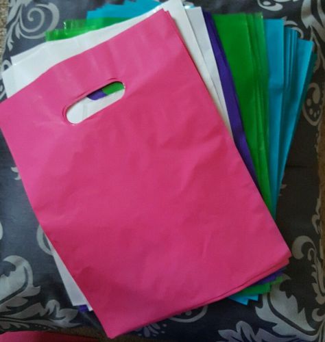 100 glossy 9&#034;x12&#034; multi color plastic merchandise bags handle retail gift bags for sale