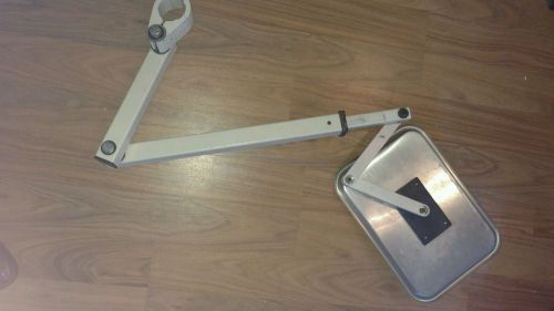 Dental tray with swivel arm