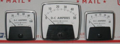 THREE GENERAL ELECTRIC DC AMPERES GAUGES