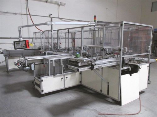 2001 HEINO ILSEMANN MODEL KVD-10 HI SPEED DVD PACKAGING MACHINE