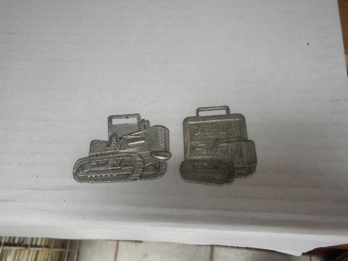 2 vintage Caterpiller watch fobs