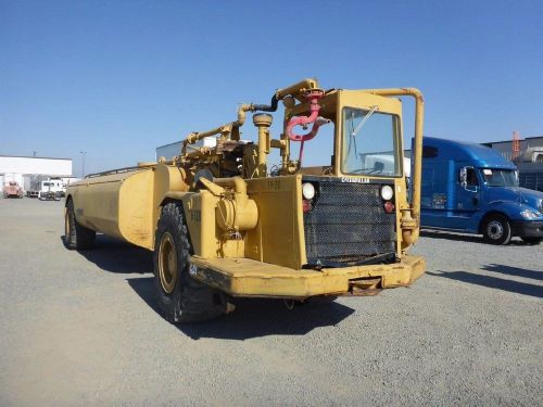 1984 caterpillar 613b 5000 gallon water wagon (stock #1990) for sale