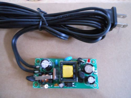 DC 12 VOLT 1 AMP ELECTRONIC VOLTAGE REGULATOR MODULE W/ AC POWER CORD