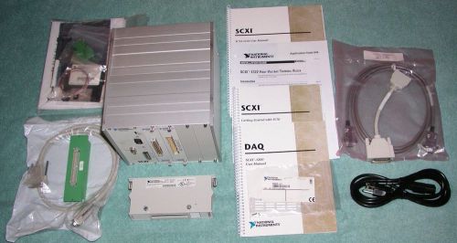 New National Instruments SCXI-2000 Mainframe with SCXI-1200 SCXI-1122 SCXI-1322