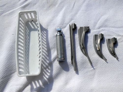 LARYNGOSCOPE HANDLE WITH THREE REG BLADES AND ONE PHILLIP&#039;S BLADE