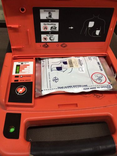 Survivalink first save cardiac arrest 9210 with battery and case defibrillator for sale