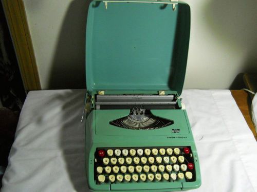 Vintage used scm smith corona cougar manual portable typewriter with case for sale