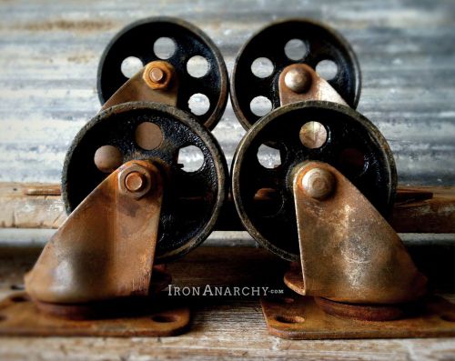 Aged caster set, vtg steel metal industrial furniture table factory cart wheel for sale