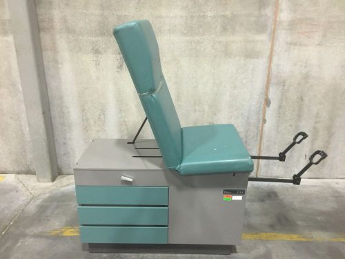 Midmark 104 examination table for sale