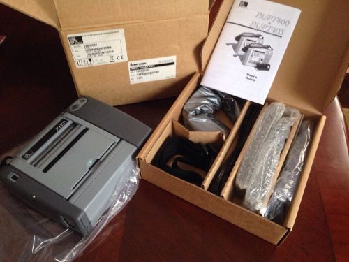 New Zebra PT400  PT403 Portable Printer. PT473-050-55400 , 2 batteries , charger