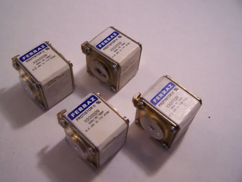 LOT OF 4 FERRAZ PROTISTOR FUSES; X300009, 660 VAC, 700A.  USED