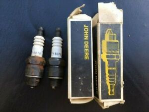 (2) NOS John Deere TY6070 Spark Plugs