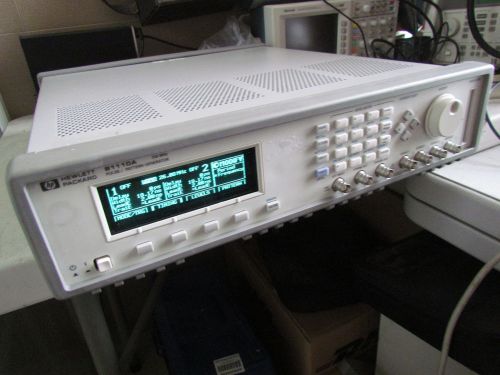 Hp / agilent 81110a w/ two  81111a output module 165 mhz pulse signal generator for sale