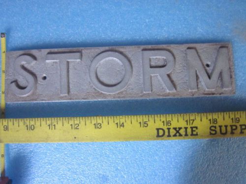 Aluminum Utility  sign  block letters &#034;STORM &#034; 10 3/4 in long 2 3/4 in wide