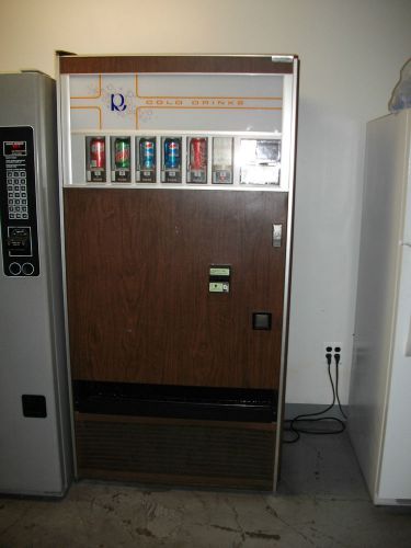 Rock ola can soda vending machine will sell coke or pepsi for sale