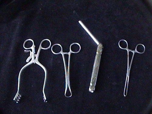 collectable instruments 1 retractor, tweezer, 1 pincer 1 trochaner 1 lot