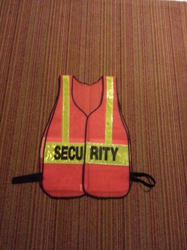 ORANGE SAFETY VESTS with SECURITY SIGNS