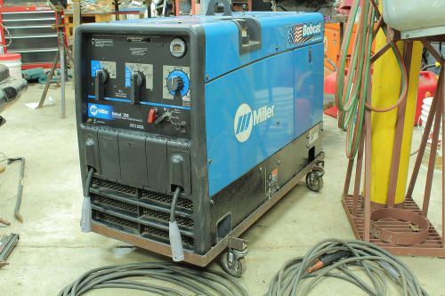 Miller bobcat gasoline welder/generator model 907211 with leads, clamps for sale