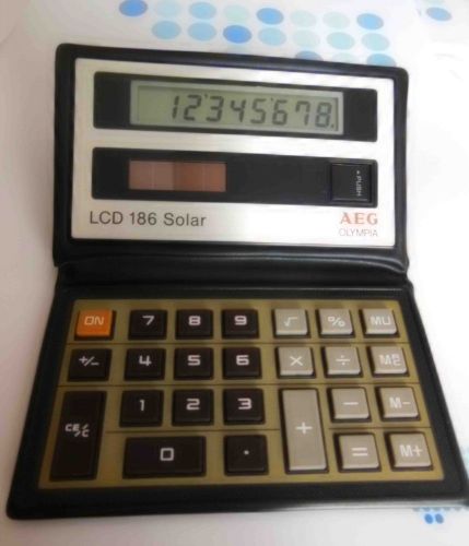 80&#039;s VINTAGE RETRO POCKET SOLAR CALCULATOR AEG OLYMPIA LCD 186