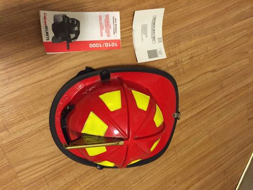CAIRNS 1010 Fire Helmet, Red, Traditional **Used**..flaps/straps/front Holder,