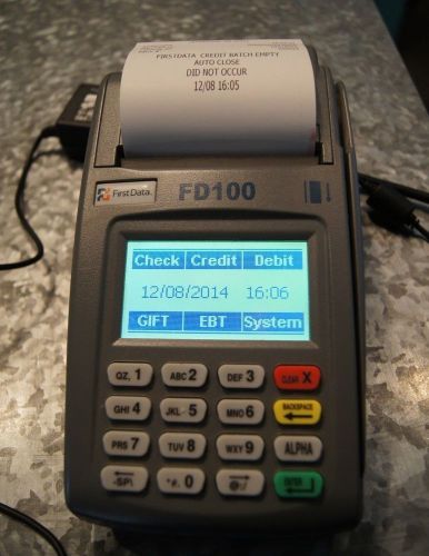 First data fd100 credit card terminal w/ extra roll of paper for sale