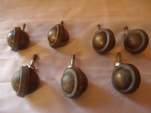 Lot of seven Shepherd brass casters