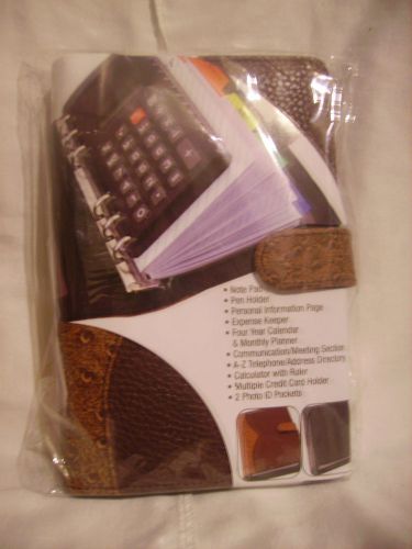 Daily planner/organizer with calculator brand new still in package!!!!! for sale