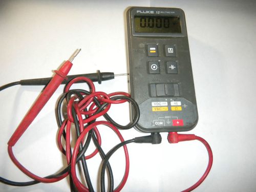 Fluke 12 Digital Multimeter Ohmmeter Voltmeter AC DC IN WORKING CONDITION.