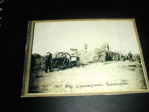 Old IHC engine and baler photo