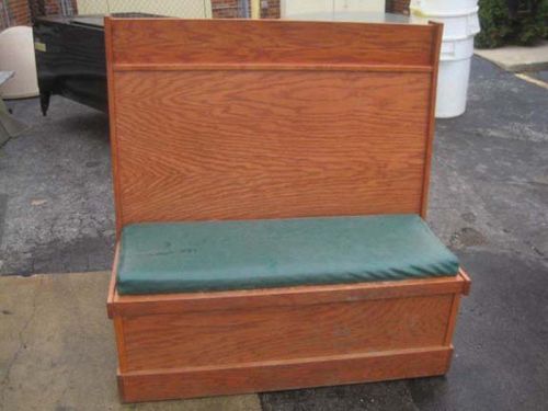 Light Wood Booths with Green Padded Seats