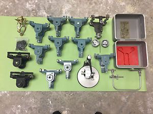 DENTAL ARTICULATOR LOT: 13 ARTICULATORS W/ ACCESSORIES AND NEY DENTAL SURVEYOR