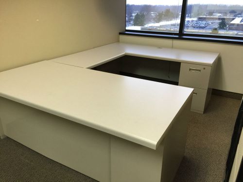 U-shape desk by steelcase office furn beige color lamin top w/metal pedestals for sale