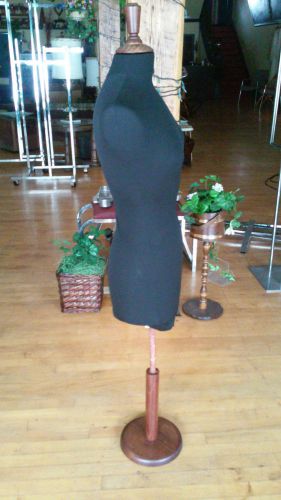 Black clothed adult female mannequin dress form adjustable on a wooden stand for sale
