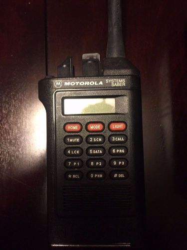 Motorola systems saber iii handie-talkie and ntn4734a battery charger for sale