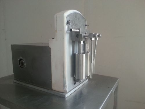 Cozzoli table top piston filler for sale