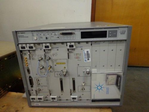 Agilent E8404A VXI Mainframe with (1) E1406A  (1) J1421A and (2) J1422B