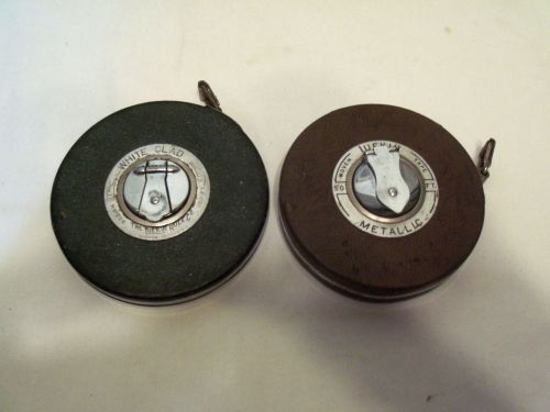 2 VINTAGE LUFKIN TAPE MEASURES 100 FT  WHITE CLAD 50 FT METALLIC