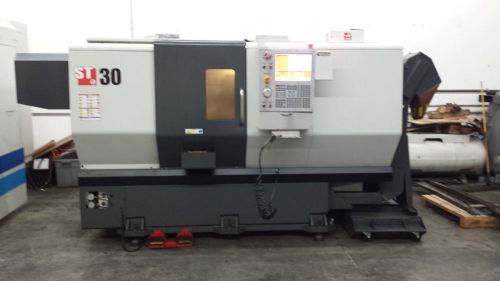 HAAS ST-30 CNC LATHE LOW HOURS, TAILSTOCK, CONVEYOR, ETC MFG 2012