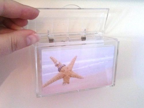 Clear acrylic business card holder with hinged lid and adhesive tape for sale