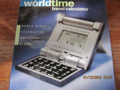 WORLD TIME TRAVEL ALARM CLOCK CALENDAR CALCULATOR TIMER
