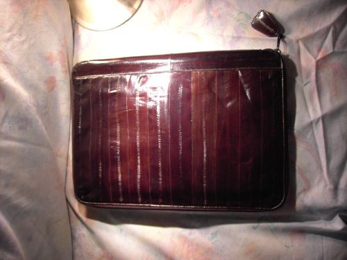 Genuine soft EEL skin burgundy zippered with pockets