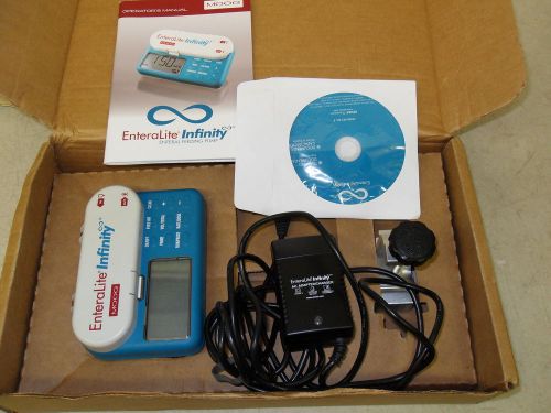 Moog Zevex Enteralite Infinity Enteral Feeding Pump, Clamp, Charger, Book &amp; CD